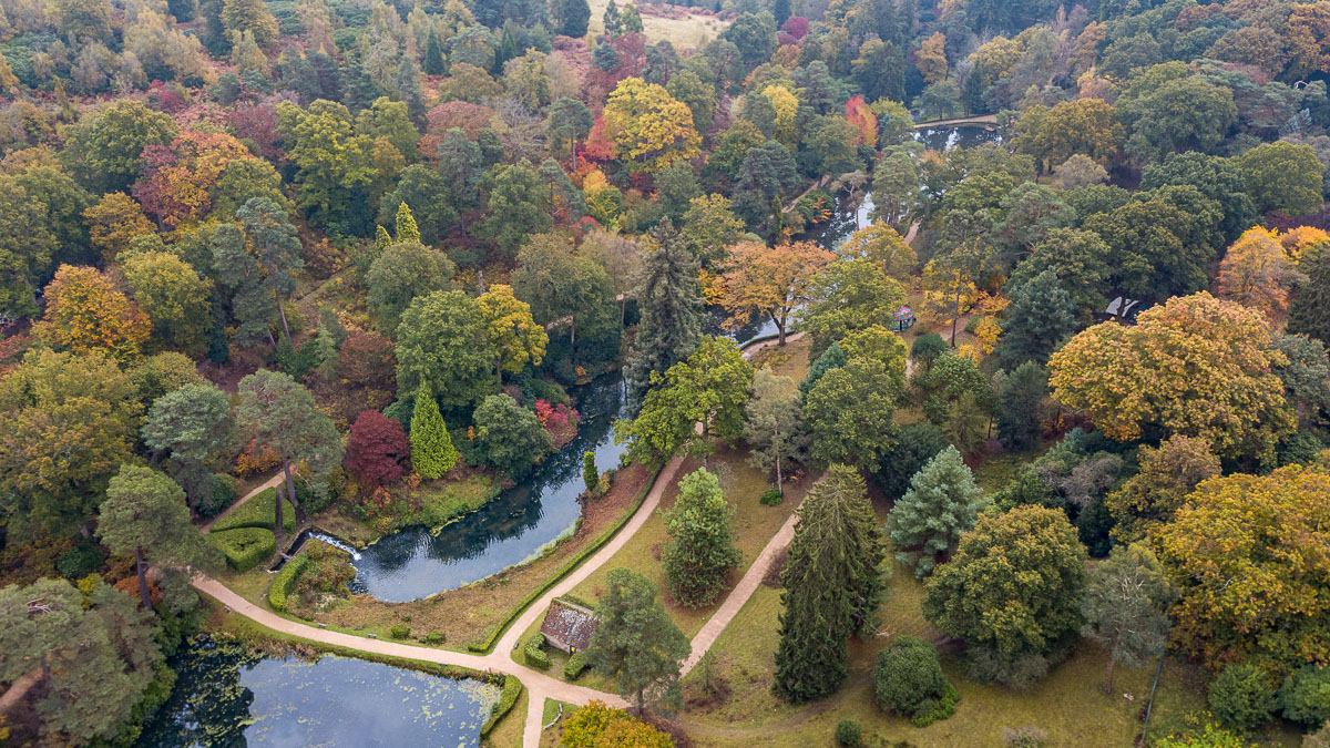 Leonardslee Lakes & Gardens Autumn Colours with small cottage, coach trip from luton