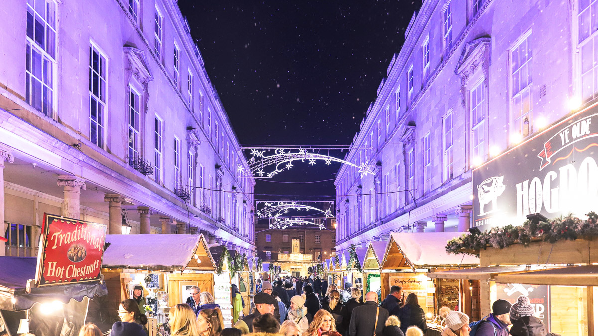 Street with market stalls and Christmas lights